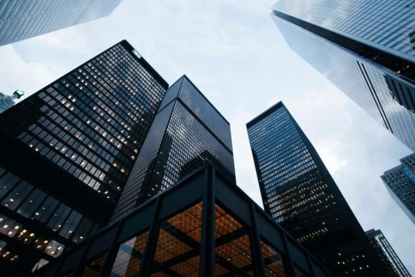 low angle photo of city high rise buildings during daytime